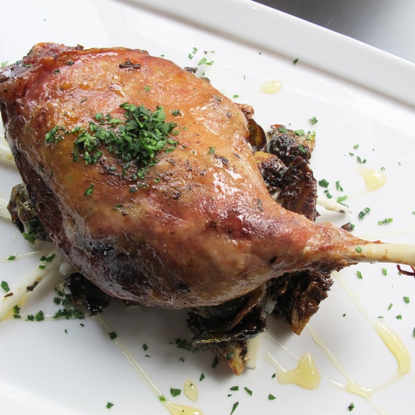 The duck confit is made with a contemporary twist on the classic French preparation. The bird is cured for a day with floral juniper berries.