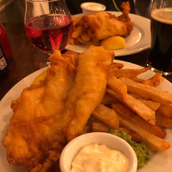 Photo taken at Cock &amp; Bull British Pub and Eatery by Allie F. on 3/17/2019