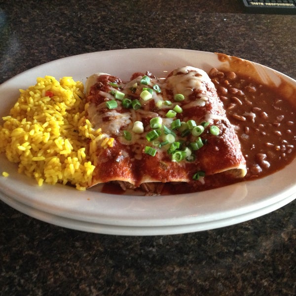 Photo taken at Original Flying Burrito by Raleigh C. on 6/5/2013