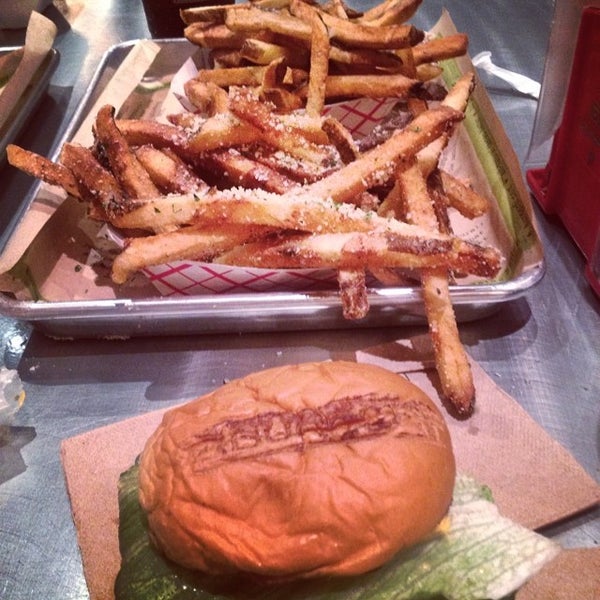 Photo taken at BurgerFi by Steve F. on 7/4/2014