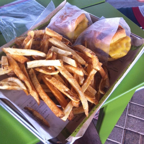 Photo taken at BurgerFi by Juan Pablo on 5/4/2014