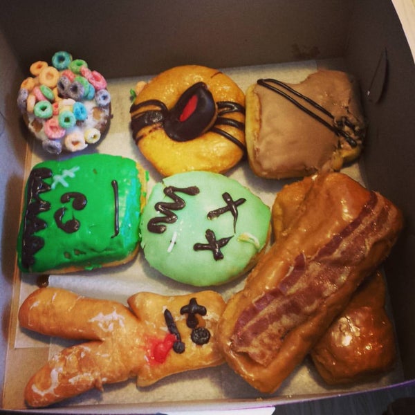 Photo taken at Zombee Donuts by Tamæra L. on 10/20/2015
