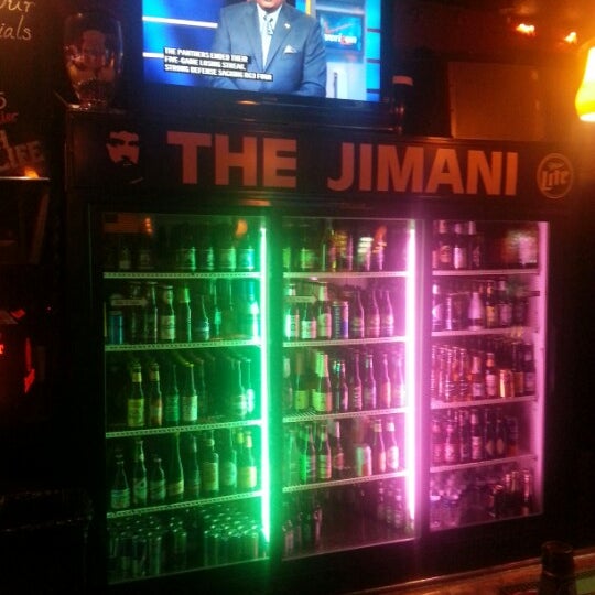 Photo taken at The Jimani Lounge &amp; Restaurant by Cindy H. on 11/4/2012