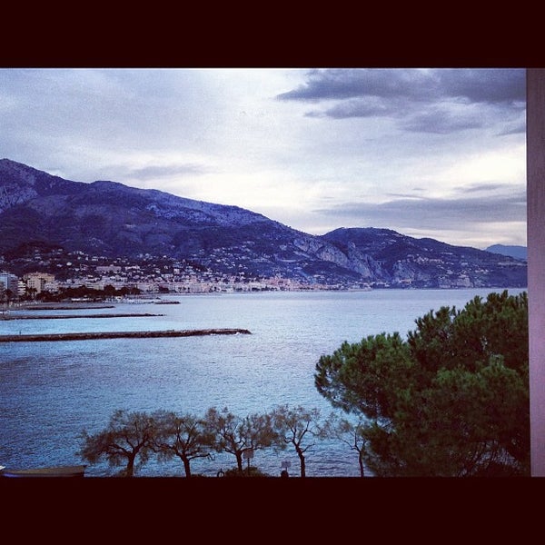 Photo taken at Plage de Roquebrune Cap Martin by MauroLips W. on 12/8/2012