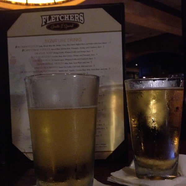 Photo taken at Fletchers Grille &amp; Spirits by Hector V. on 5/3/2014