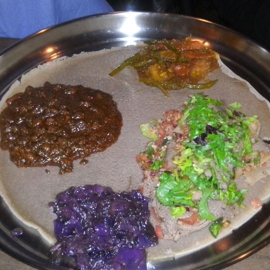 Photo taken at Ras Dashen Ethiopian Restaurant by Aliye 🇹🇷 on 1/25/2015