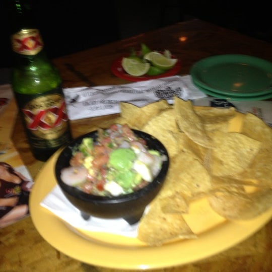 Photo taken at Ojos Locos Sports Cantina by Carlos on 10/11/2012