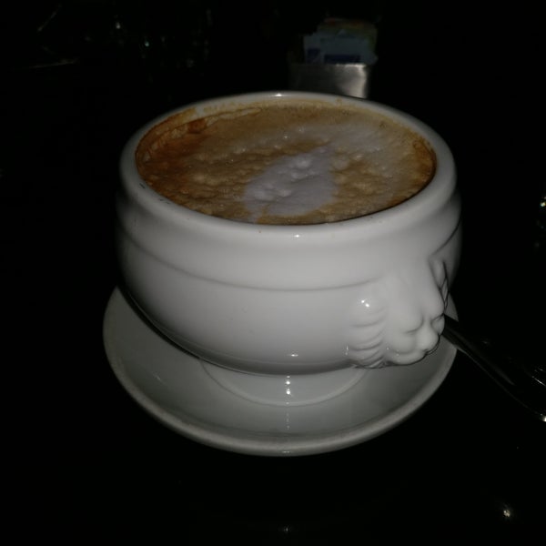 Cafe au lait served in a small urn.