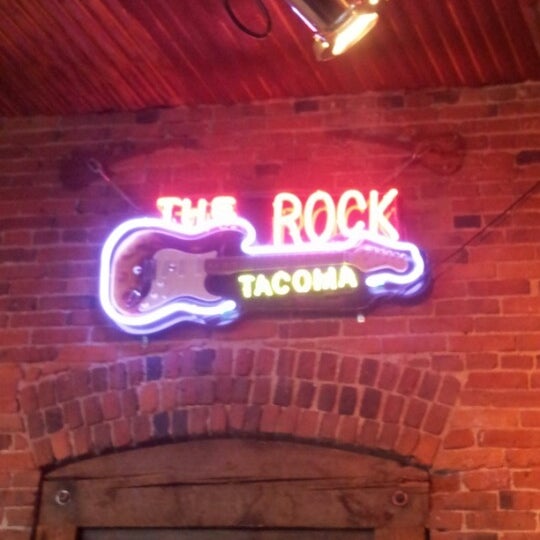 Photo taken at The Rock Wood Fired Pizza by Lori C. on 11/1/2012