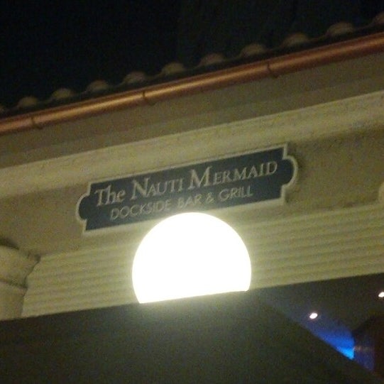 Photo taken at The Nauti Mermaid Dockside Bar &amp; Grill by melinda on 9/22/2013
