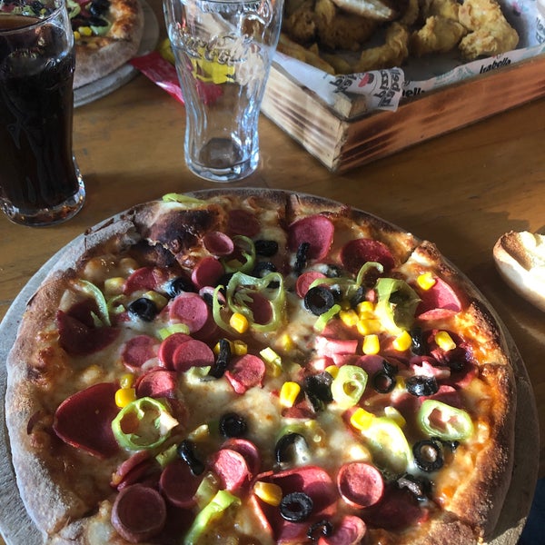 Photo taken at İzabella Pizza by Havva Ö. on 7/4/2020