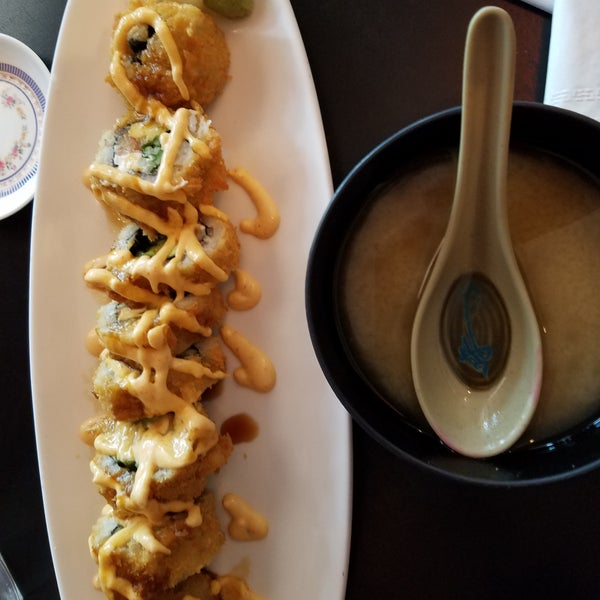 Photo taken at Village Sushi &amp; Grill by Stephanie A. on 10/11/2017