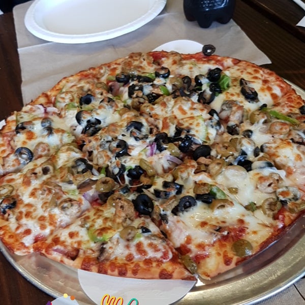The place is not that good, service is slow, but pizza is good. The small size is very huge