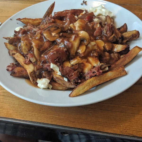 Photo taken at Restaurant Poutineville Saint-Roch by Anthony P. on 7/26/2019