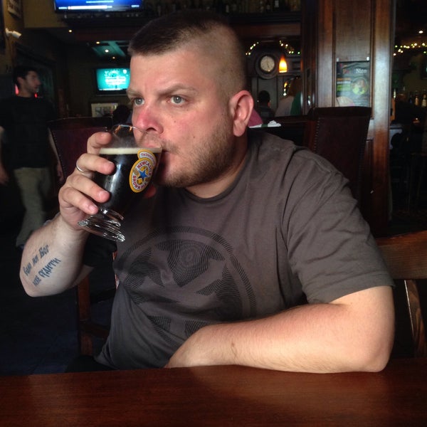 Photo taken at Sláinte Pub &amp; Grill by Isaiah B. on 6/10/2016