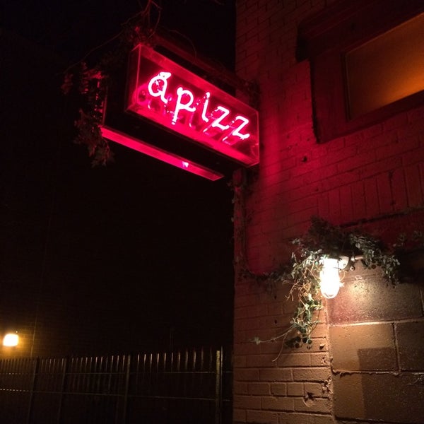 Photo taken at Apizz Restaurant by Nick C. on 3/23/2014