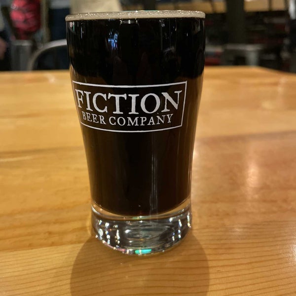 Photo taken at Fiction Beer Company by Andrew A. on 1/16/2022