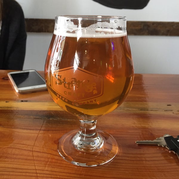 Photo taken at Strange Craft Beer Company by Andrew A. on 4/7/2018