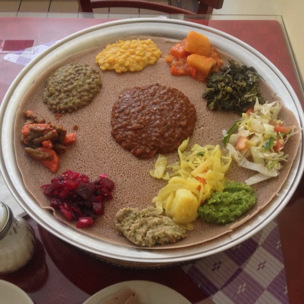 Photo taken at Bete Ethiopian Cuisine &amp; Cafe by Crash Kalwa on 2/14/2014