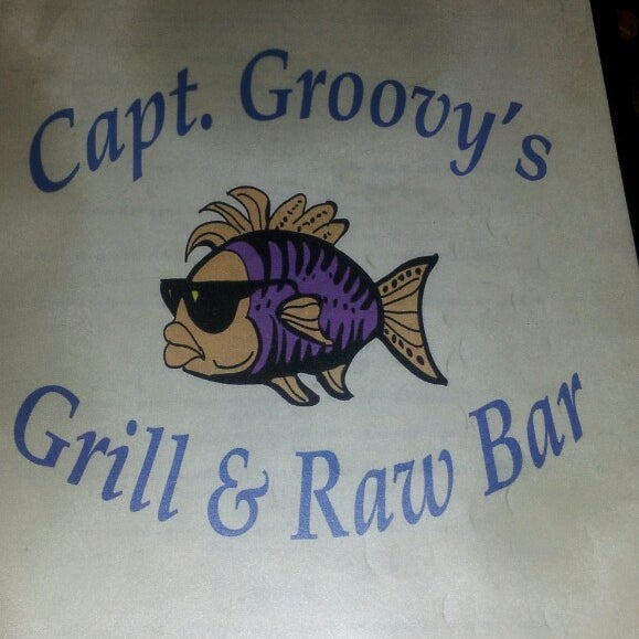 Foto tirada no(a) Captain Groovy&#39;s Grill and Raw Bar por Candyce S. em 5/20/2013