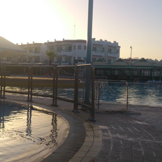 Photo taken at Pool at Dreams Beach Resort by Nermine A. on 5/28/2013