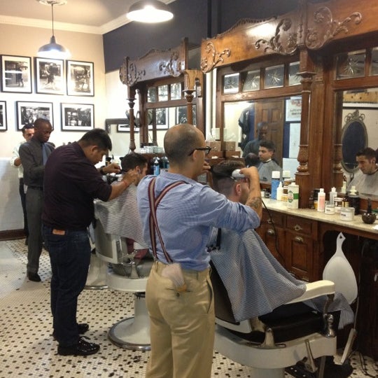 Photo taken at Neighborhood Cut and Shave Barber Shop by Alex N. on 10/4/2012