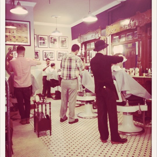 Photo taken at Neighborhood Cut and Shave Barber Shop by Alex N. on 10/1/2012