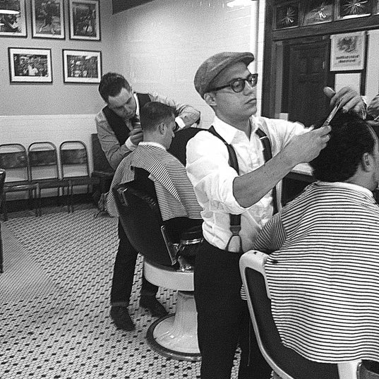 Photo taken at Neighborhood Cut and Shave Barber Shop by Alex N. on 10/2/2012