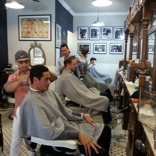 Photo taken at Neighborhood Cut and Shave Barber Shop by Alex N. on 11/4/2012
