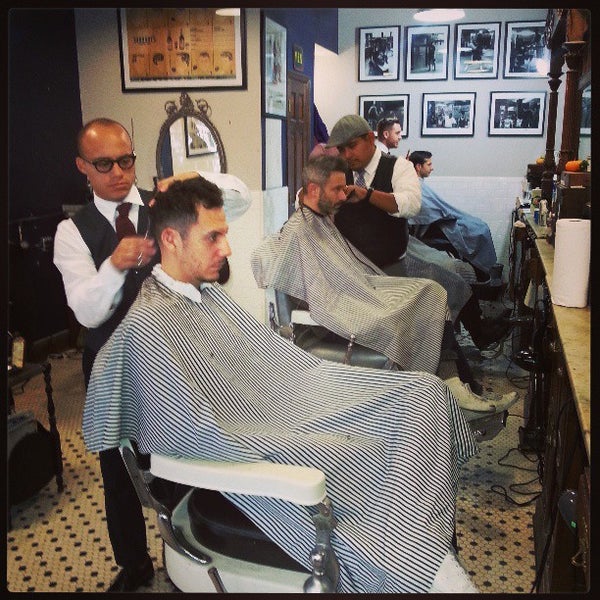 Photo taken at Neighborhood Cut and Shave Barber Shop by Alex N. on 4/7/2013