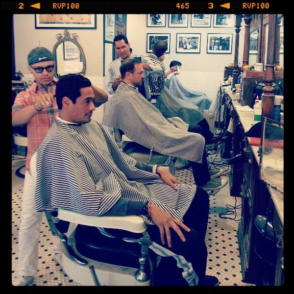Photo taken at Neighborhood Cut and Shave Barber Shop by Alex N. on 11/29/2012