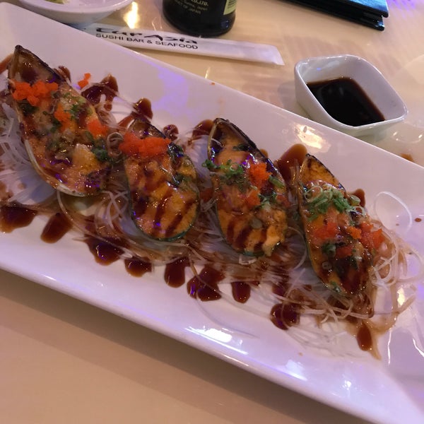 Photo taken at Eurasia Sushi Bar &amp; Seafood by Martin G. on 12/30/2017