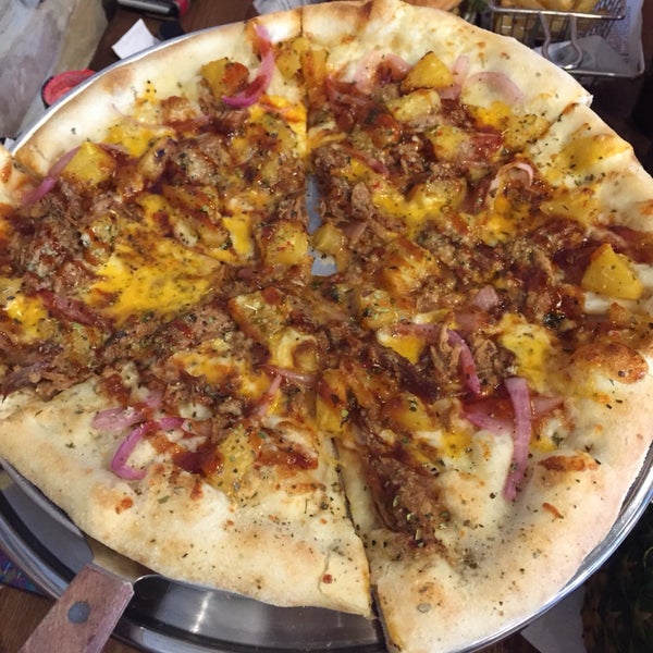 Get the pulled pork pizza and add pineapple and a zesty bbq sauce drizzle!