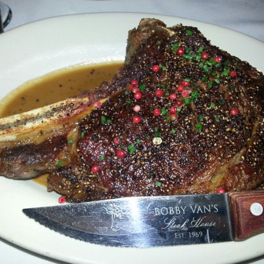 Photo taken at Bobby Van&#39;s Steakhouse by Raymond W. on 3/23/2013