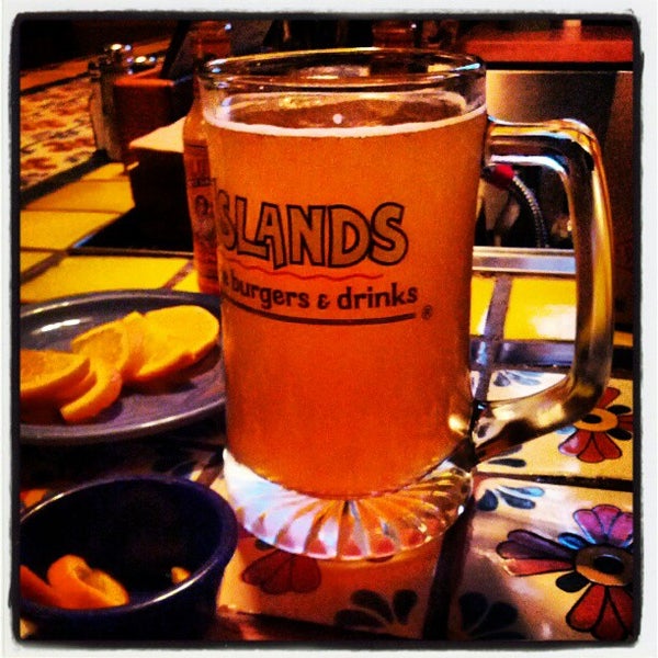 Photo taken at Islands Restaurant by Kim A. on 1/19/2013