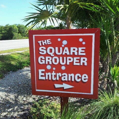 Photo taken at Square Grouper Bar and Grill by Adam V. on 12/7/2012