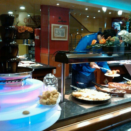 Photo taken at Restaurante LAS PALOMAS Buffet&amp;Tapas by Emanuele C. on 1/26/2013