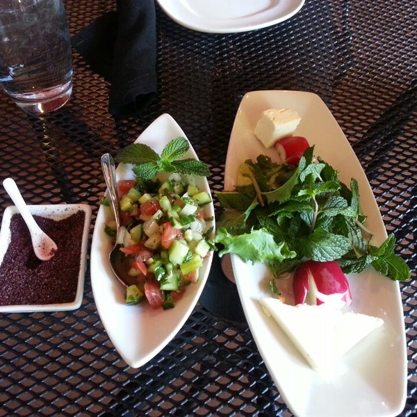 Photo taken at Pomegranate on Main by CHI-HAN L. on 5/14/2013