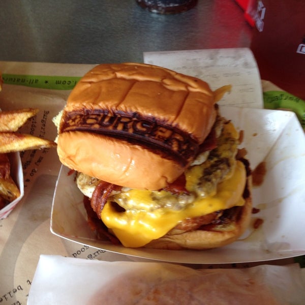 Photo taken at BurgerFi by LB on 8/3/2014