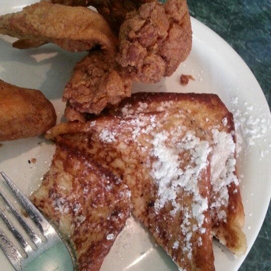 Photo taken at Kiki&#39;s Chicken And Waffles by Piscean Q. on 12/2/2012