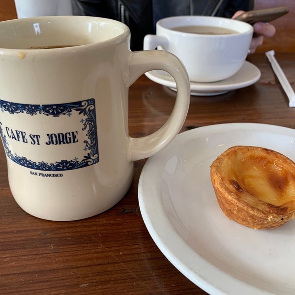 Photo taken at Cafe St. Jorge by Adam K. on 7/20/2019