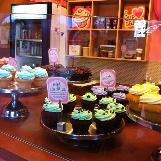 Photo taken at Cupcakes on Denman by Marie on 10/3/2012