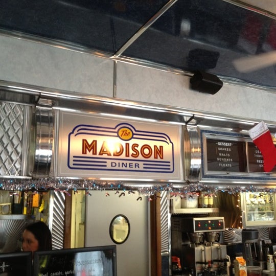 Photo taken at The Madison Diner by Joel K. on 12/26/2012