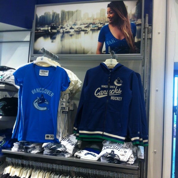 Photo taken at Canucks Team Store by Olga on 11/25/2013