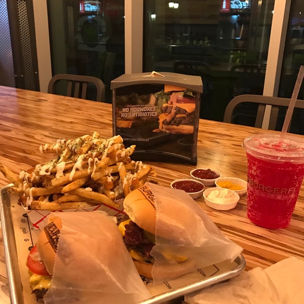 Photo taken at BurgerFi by Close on 7/20/2017