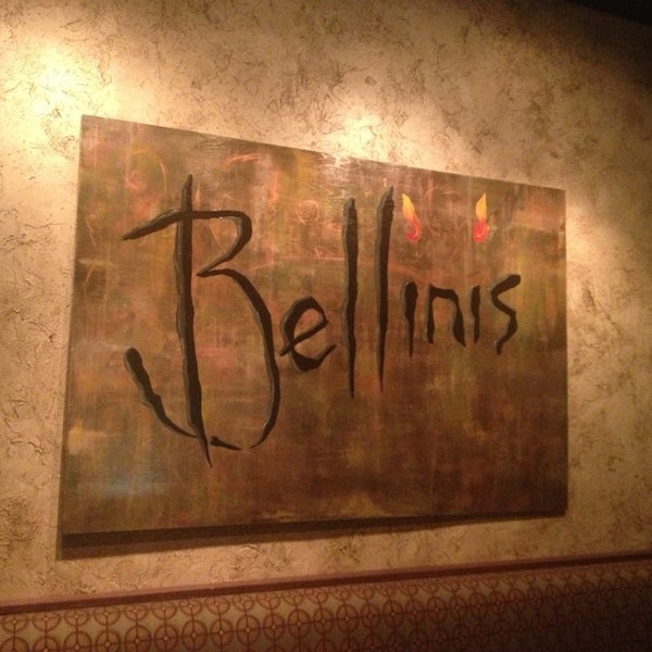 Photo taken at Bellini&#39;s Ristorante &amp; Bar by Andy F. on 12/25/2012