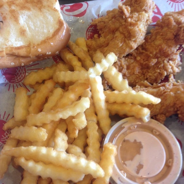 Photo taken at Raising Cane&#39;s Chicken Fingers by Angela S. on 5/25/2014