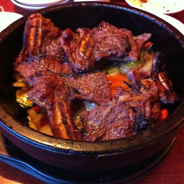 Photo taken at Dolsot House | K-Town BBQ Korean Restaurant by J T. R. on 10/7/2012