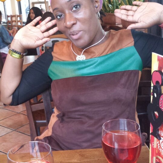 Photo taken at Nando&#39;s by Andrada C. on 8/16/2013
