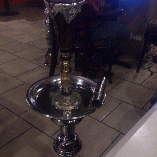 Photo taken at Sinbad&#39;s Hookah Bar by Victor S. on 12/5/2012